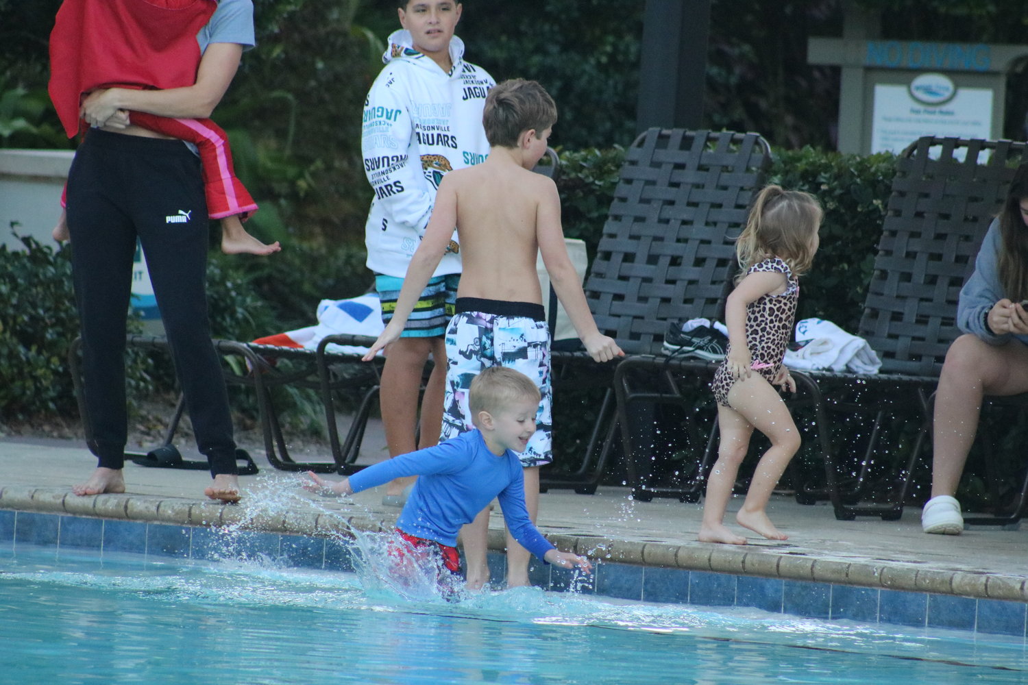 Some children could not wait to get in the water even before the official plunge.